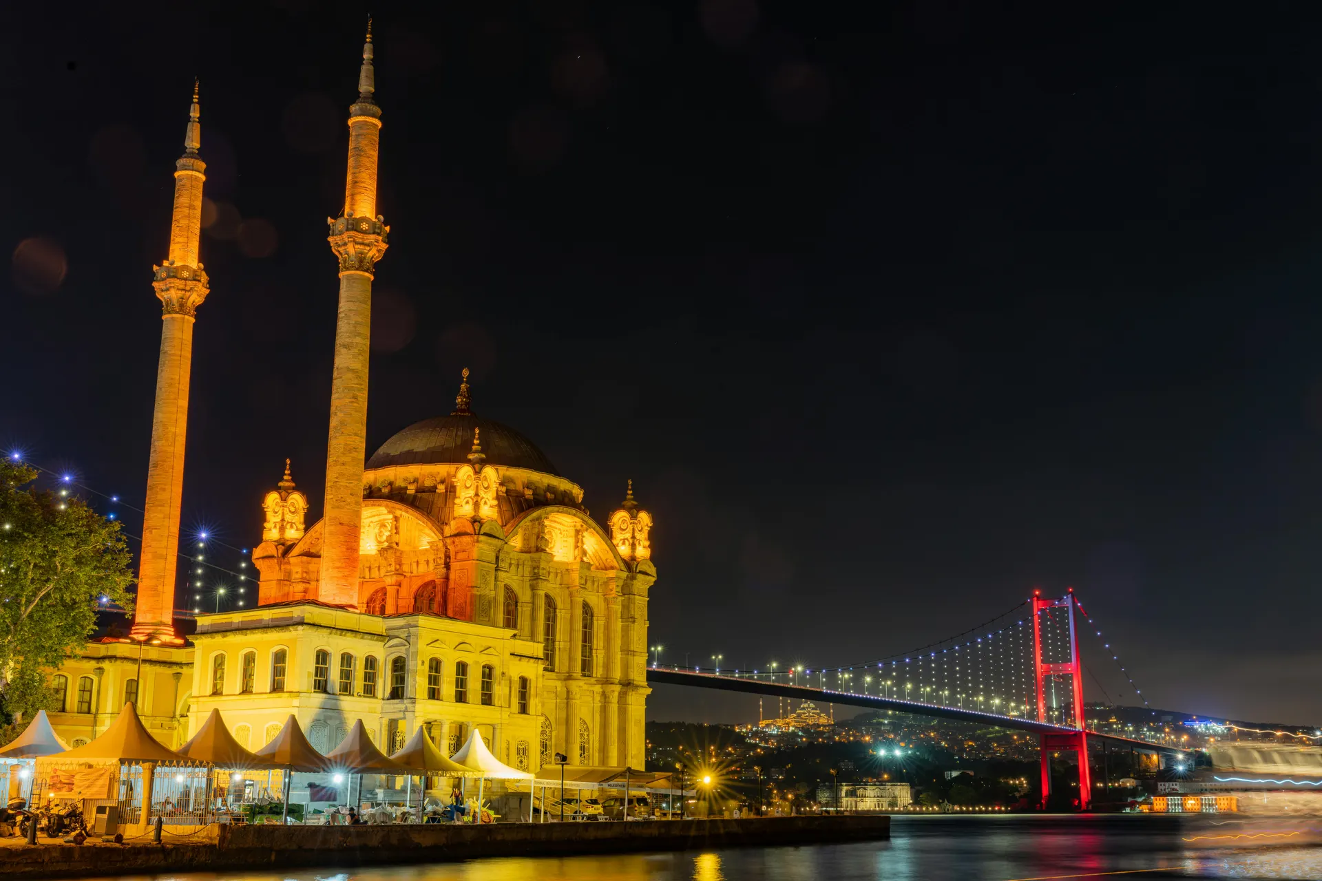 Ortaköy Mosque at night with the Bosphorus Bridge behind